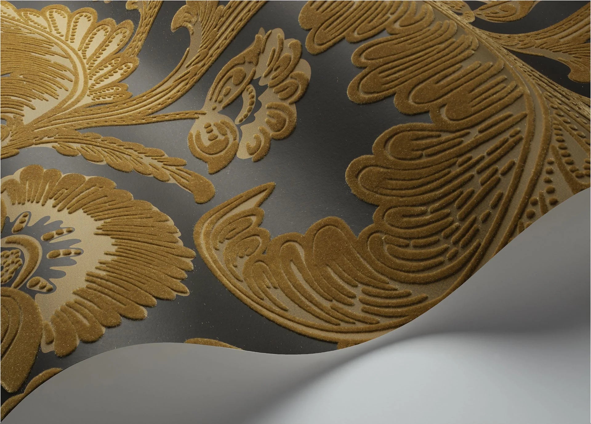 Cole & Son The Pearwood Collection. Fanfare Flock, Ochre on Charcoal